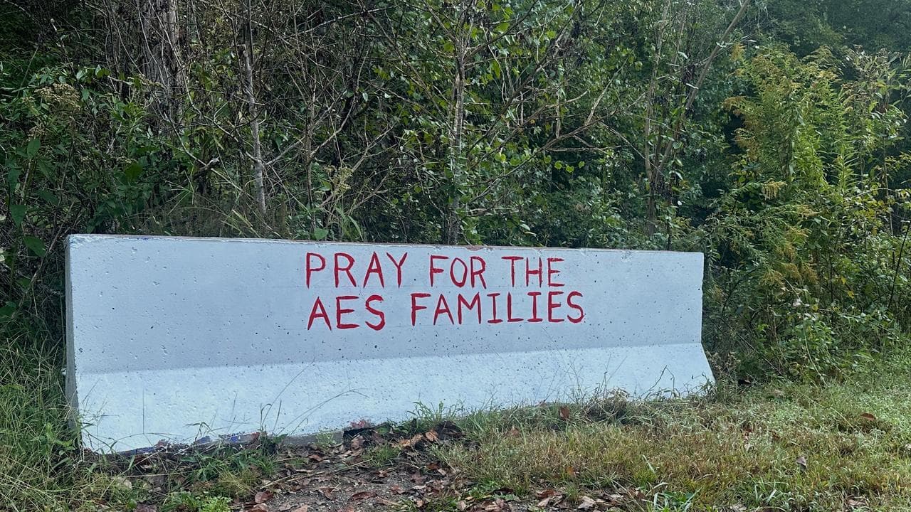 A sign near the site of an explosion at a manufacturing plant