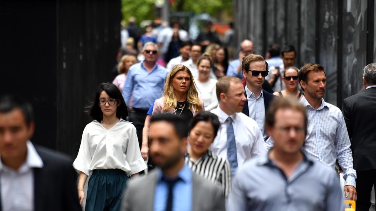 Office workers are seen at lunch break at Martin Place in Sydney
