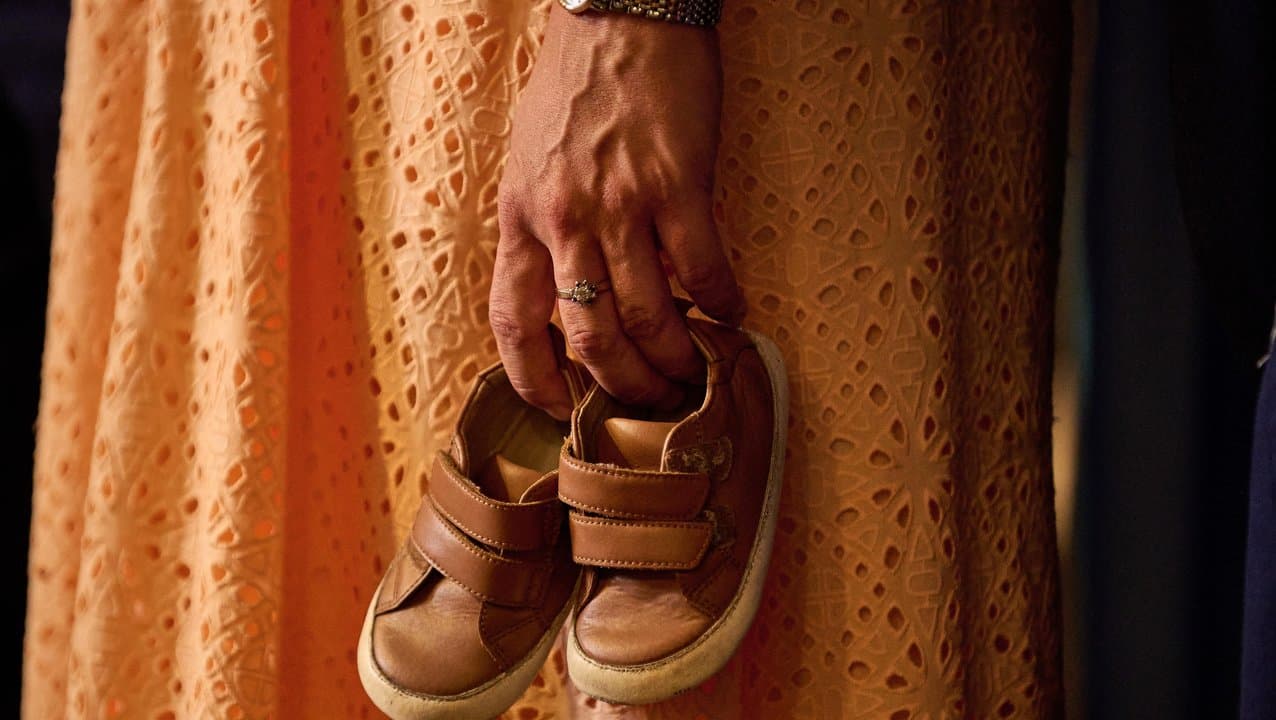 Elouise Massa with her son's shoes