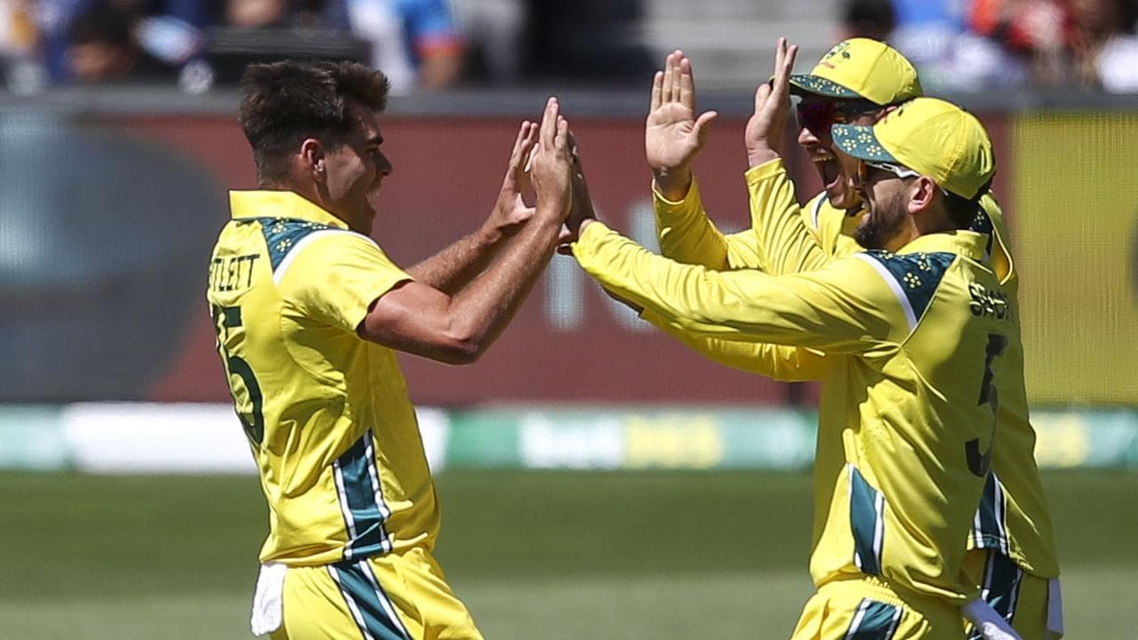 Teammates congratulate Xavier Bartlett