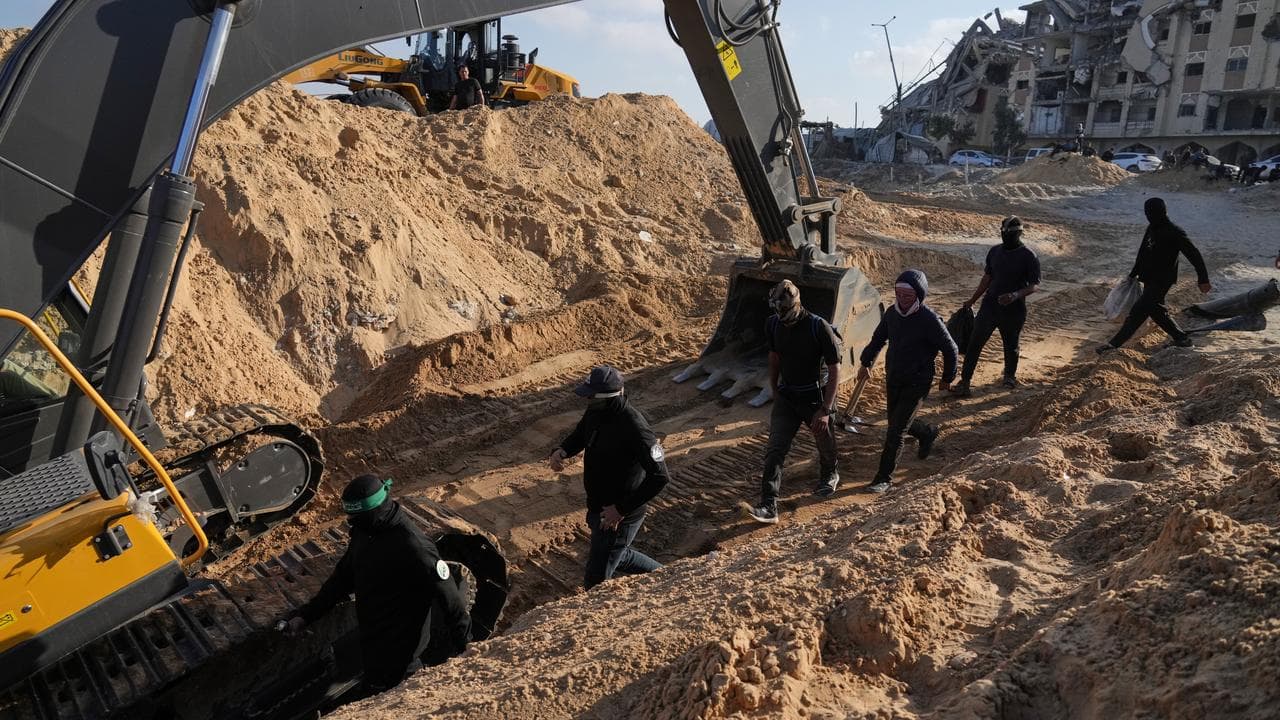 Egyptian crews helping in the recovery of hostages' bodies in Gaza