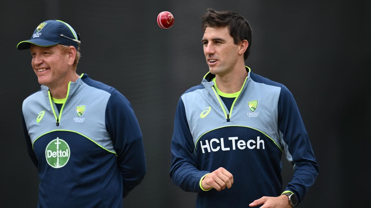 (L-R) Andrew McDonald and Pat Cummins.