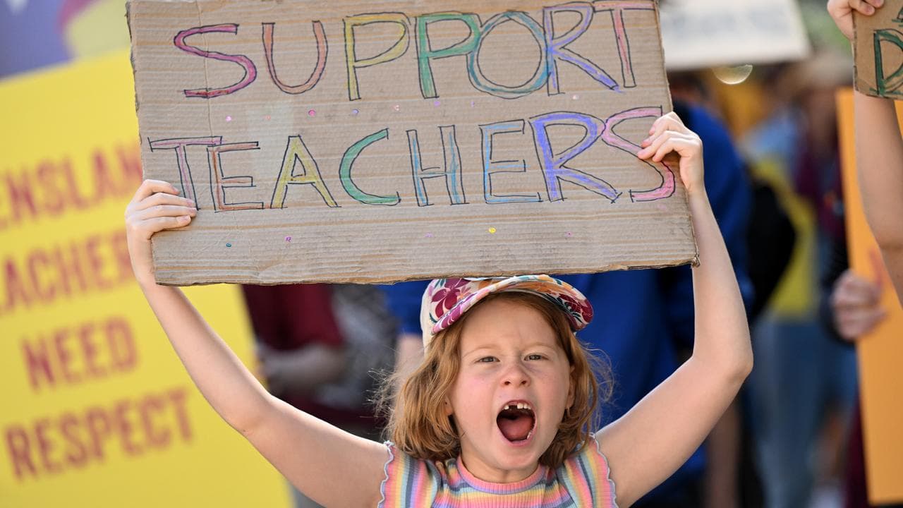 A young student supporting teachers on strike in Queensland