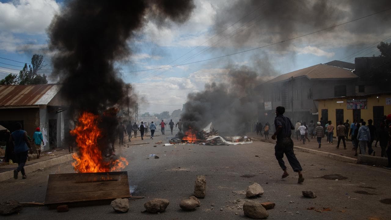 People protest in the streets of Arusha, Tanzania, on election day