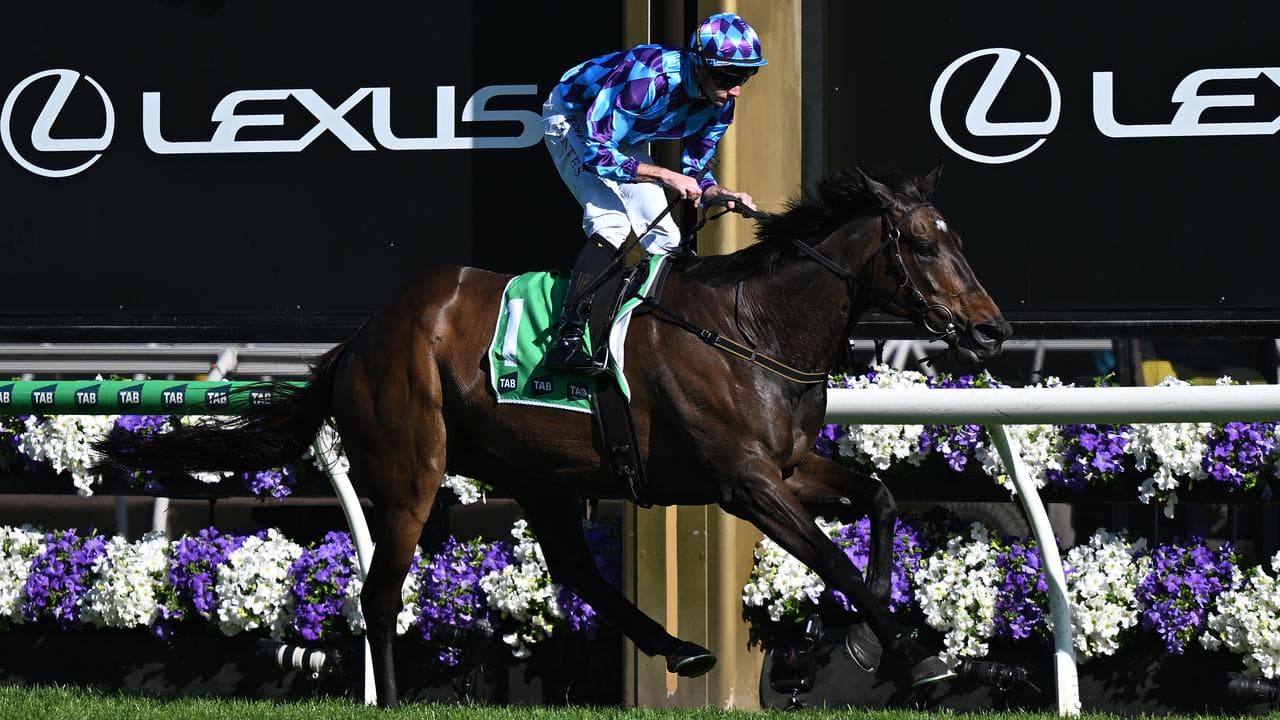 Jockey Declan Bates rides Pride Of Jenni to victory