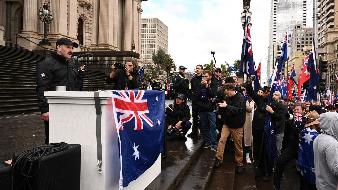 Thomas Sewell speaking to protesters at a rally in August
