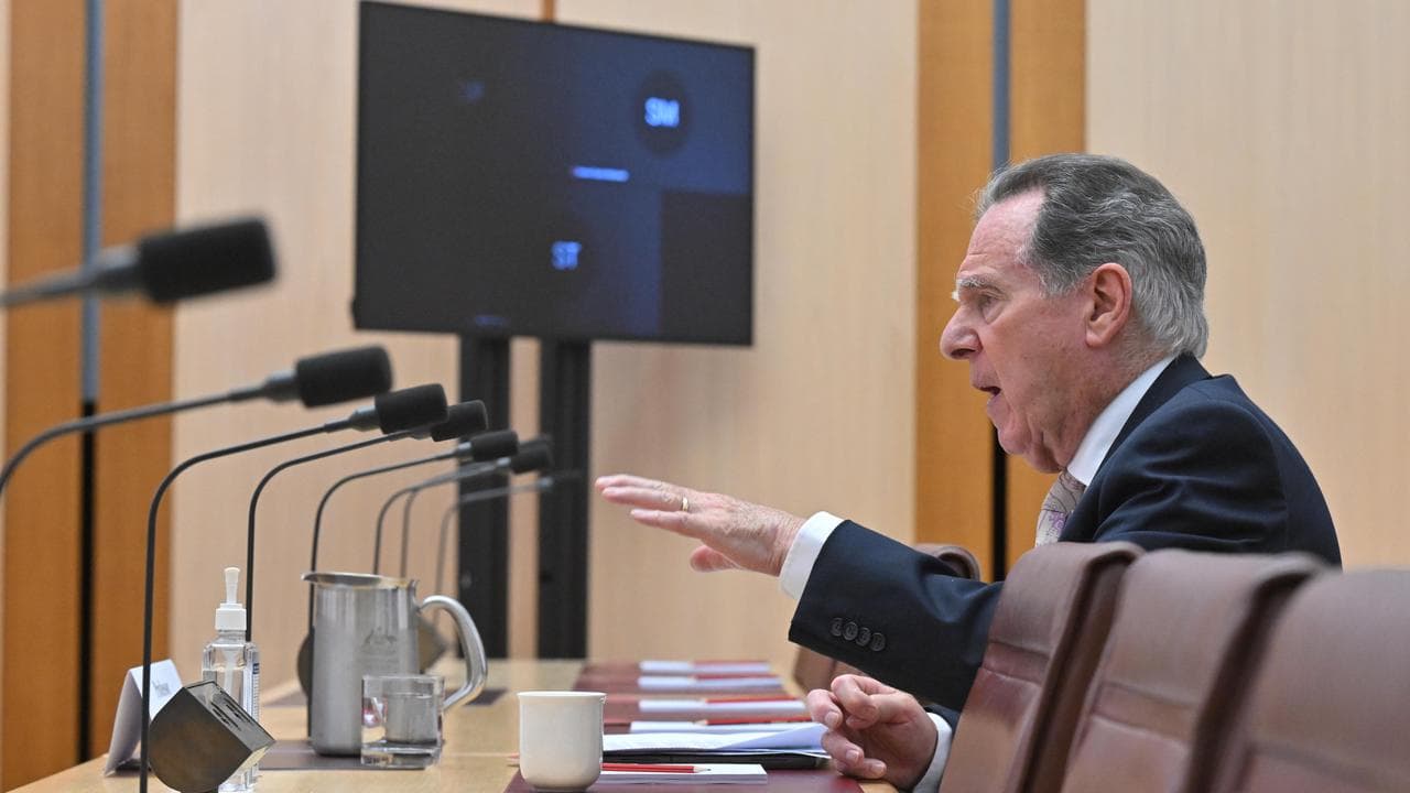 Professor Graeme Samuel at a public hearing at Parliament House