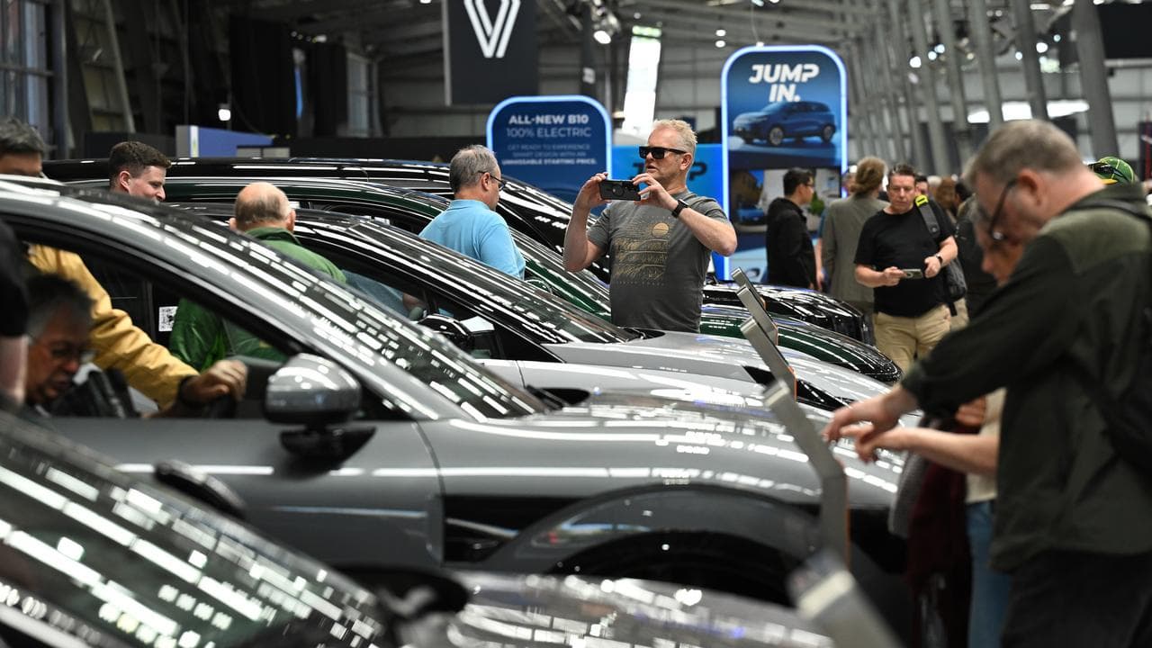 People viewing displays at Everything Electric