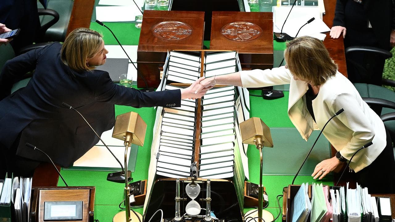 Opposition Leader Jess Wilson shakes hands with Premier Jacinta Allan