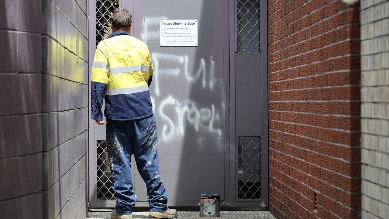 Graffiti is removed from a door in Woollahra (file)