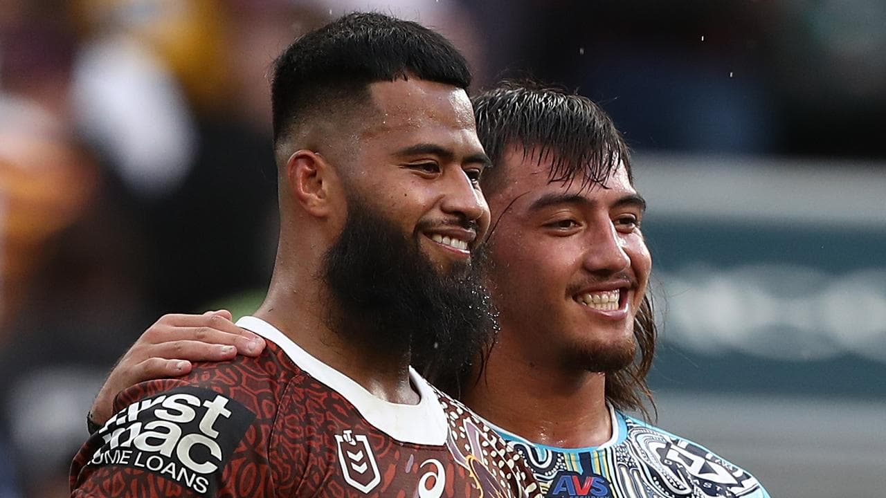 Payne Haas of the Broncos and Klese Haas of the Titans (file)