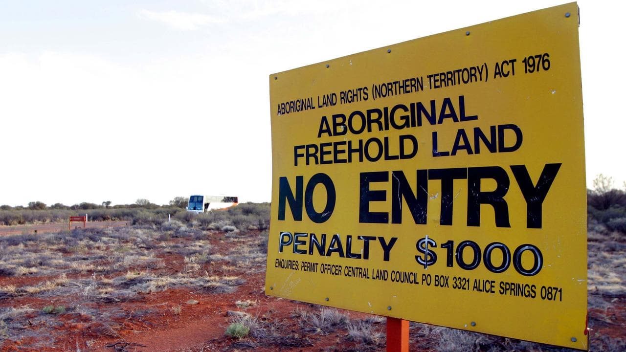 A photo of a 'No Entry' sign near Uluru.
