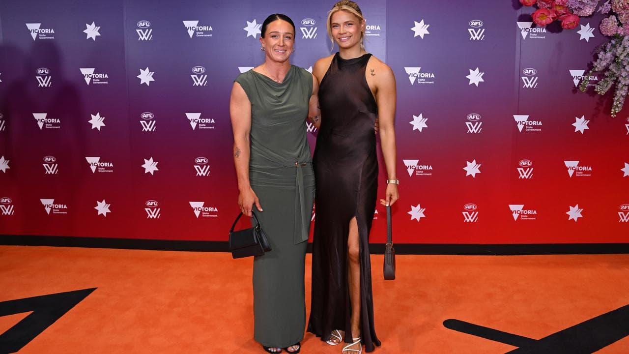 Georgie Prespakis (R), seen with fellow Cat Julia Crockett-Grills.