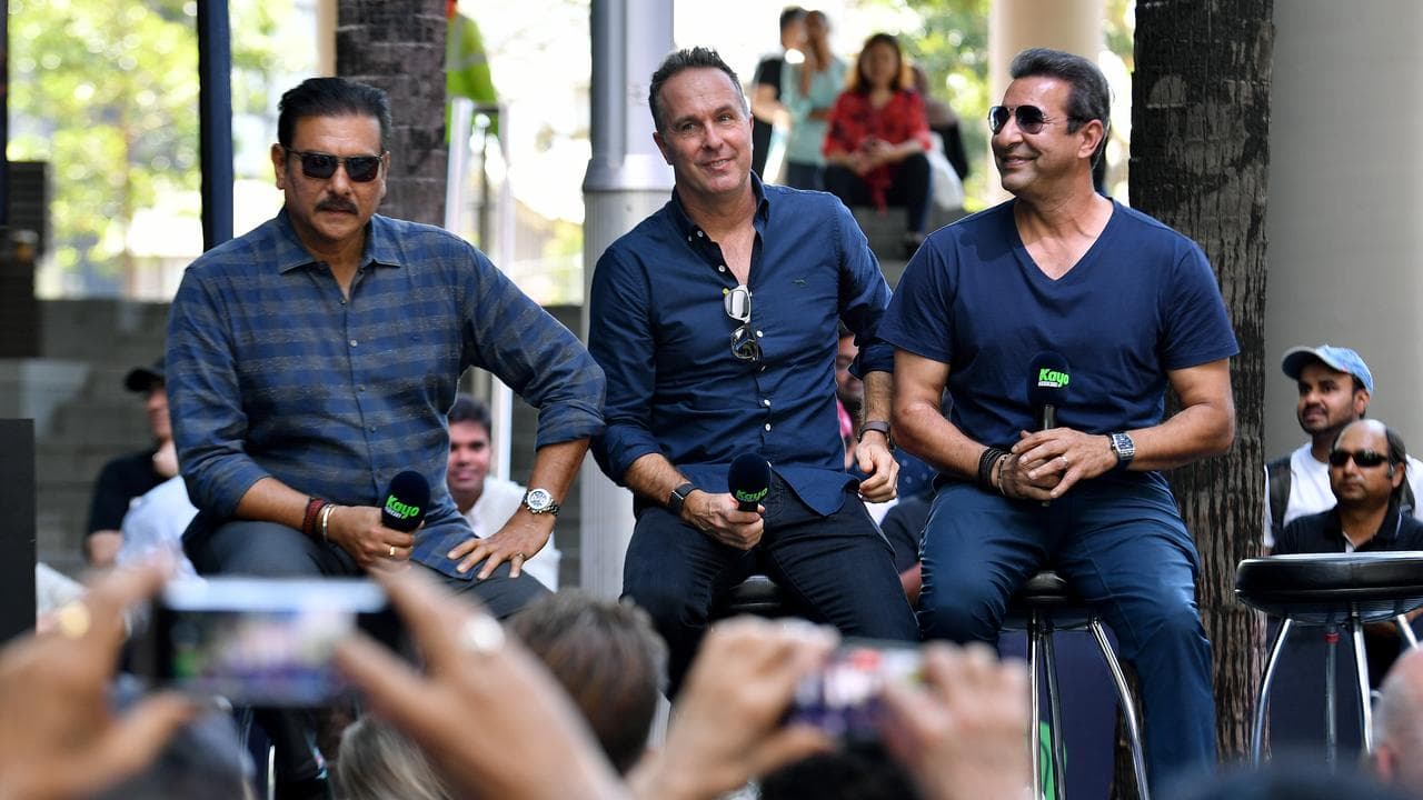 Former England captain Michael Vaughan (centre)