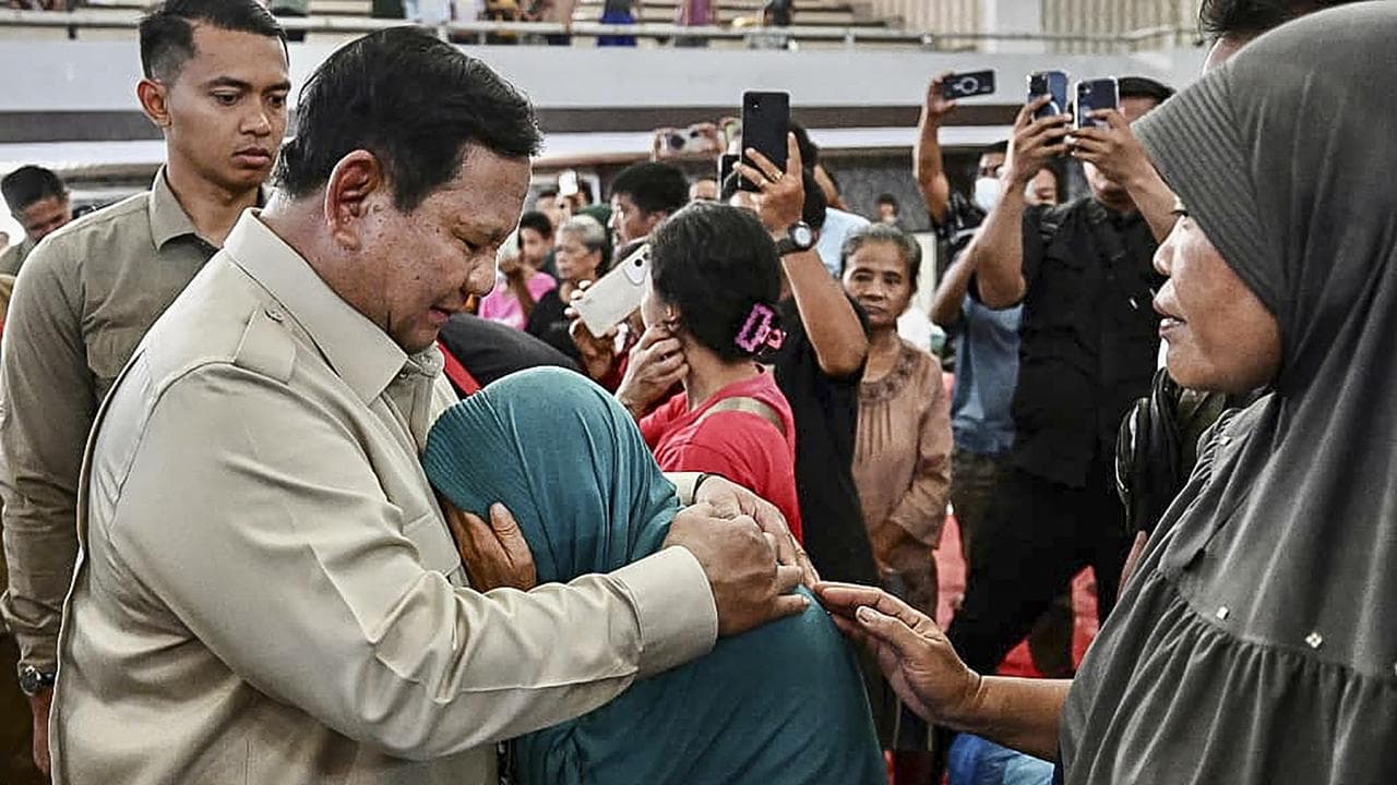 President Prabowo Subianto comforts a flood survivor in North Sumatra