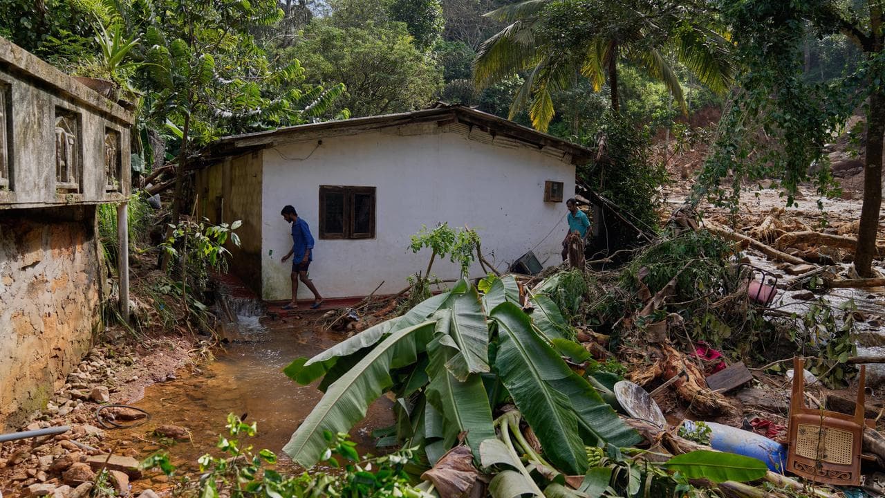 Landslide survivors search for their belongings in Kandy, Sri Lanka