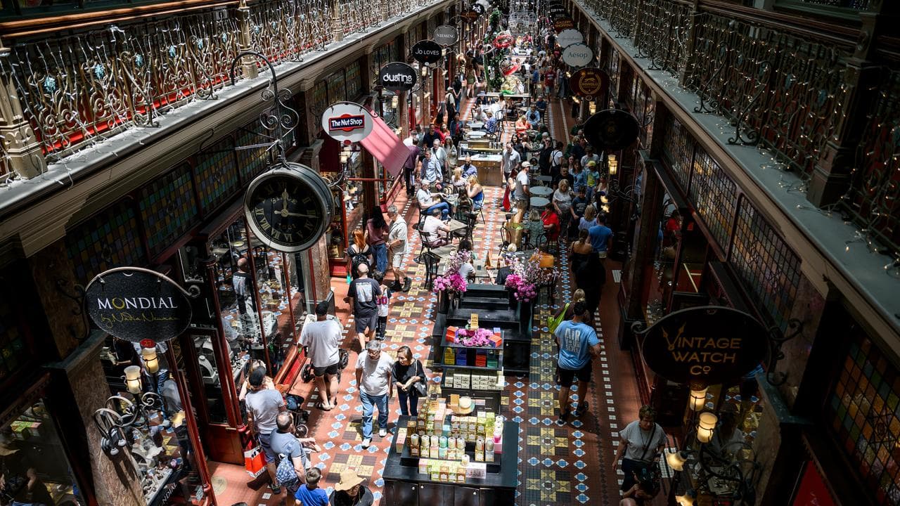 Shoppers are seen on Christmas Eve in Sydney