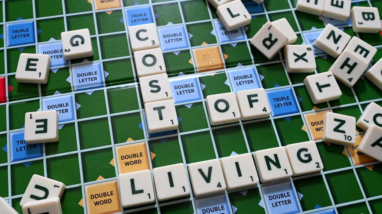 The words ‘Cost of Living’ on a Scrabble board (file image)