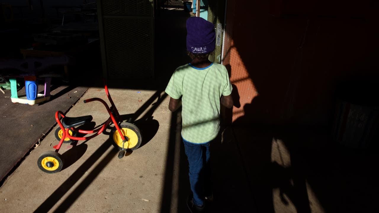 A child is seen at the Alice Springs Women's Shelter