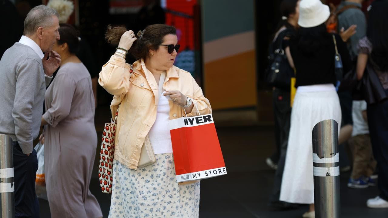 A shopper outside a Myer store