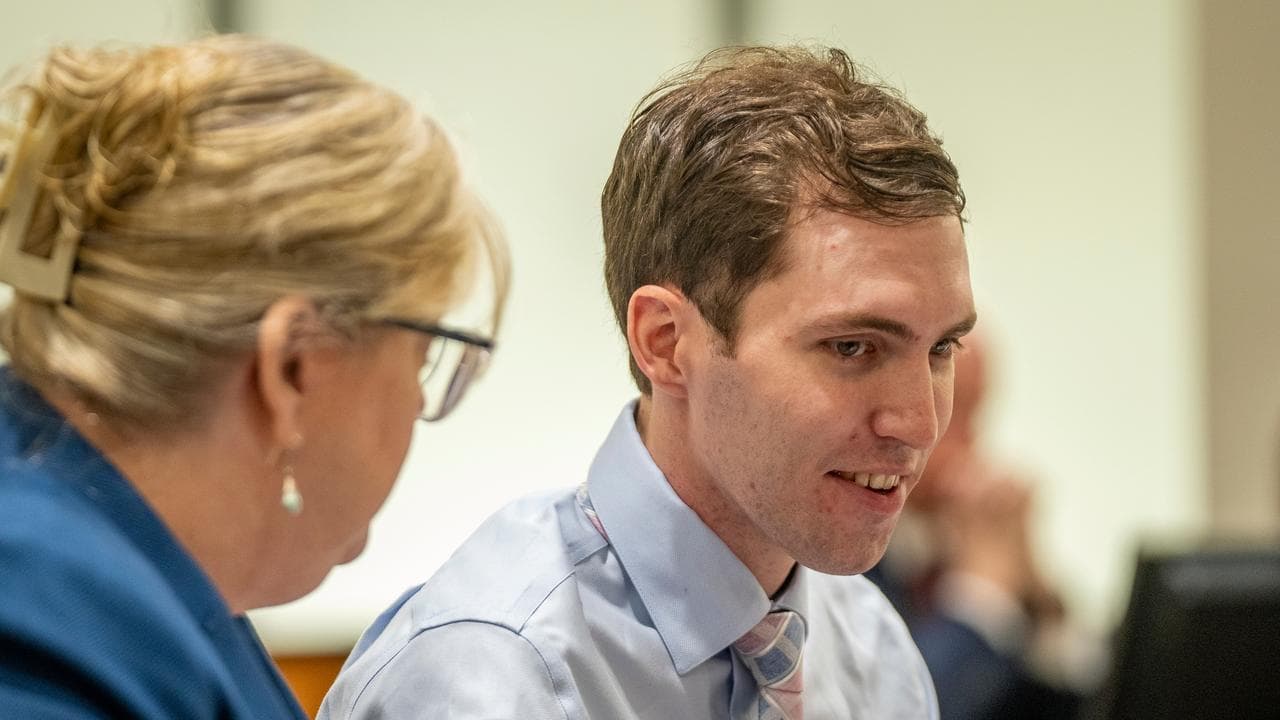 Lawyer Kathryn Nester speaks to Tyler Robinson in a Utah court