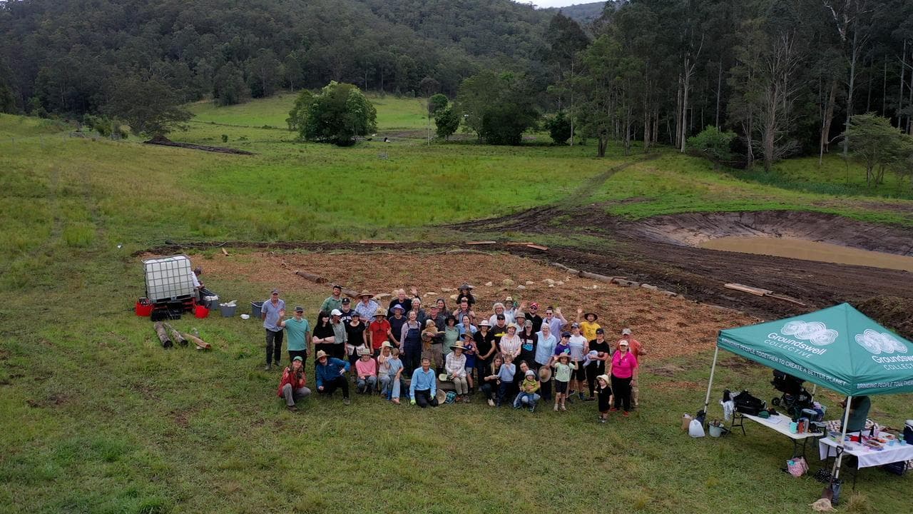 volunteers at a planting day for a tiny forest in Wyong Creek, NSW,