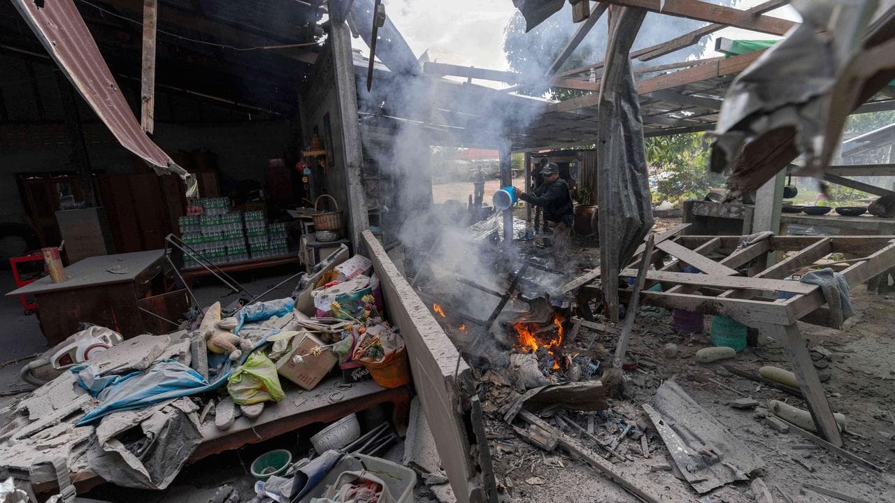 Fire at a house after a Cambodian strike in Surin province, Thailand