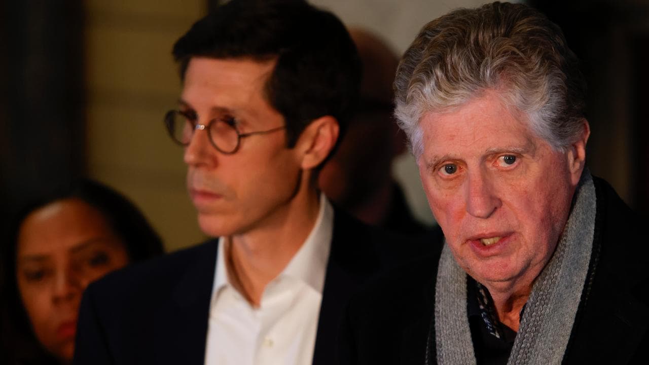 Rhode Island Gov. Dan McKee, right, Mayor Brett Smiley