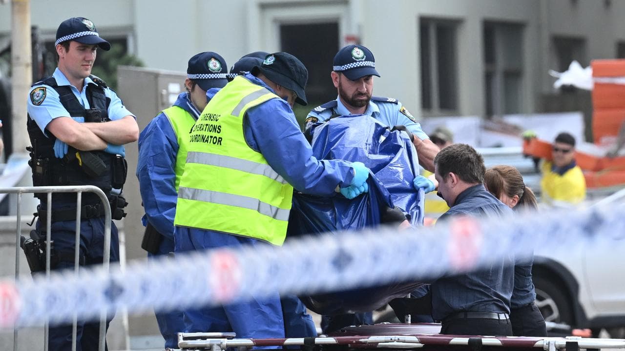 NSW Police and Forensics officers at the shooting scene