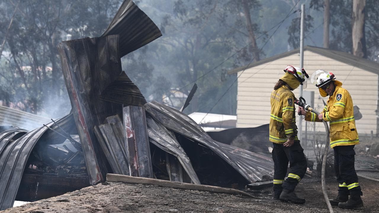 A bushfire destroys homes on the Central Coast
