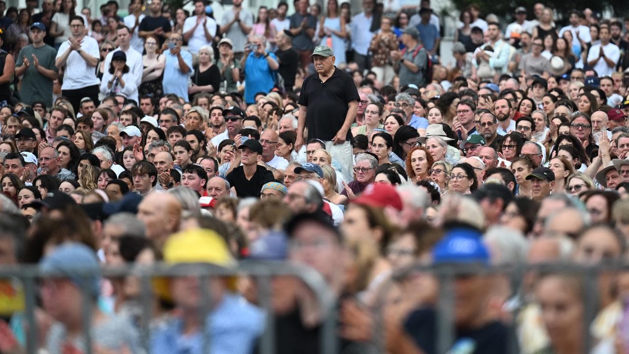 A large crowds attends a National Day of Reflection at Bondi Beach.
