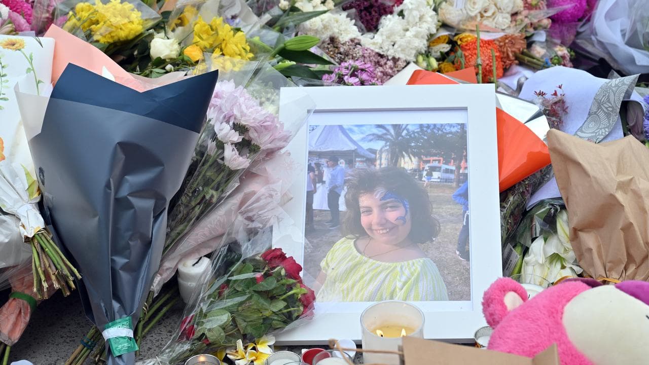 Flowers are seen at a makeshift memorial at the Bondi Pavillion