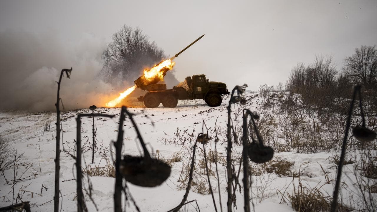 A rocket launcher is fired at Russian positions