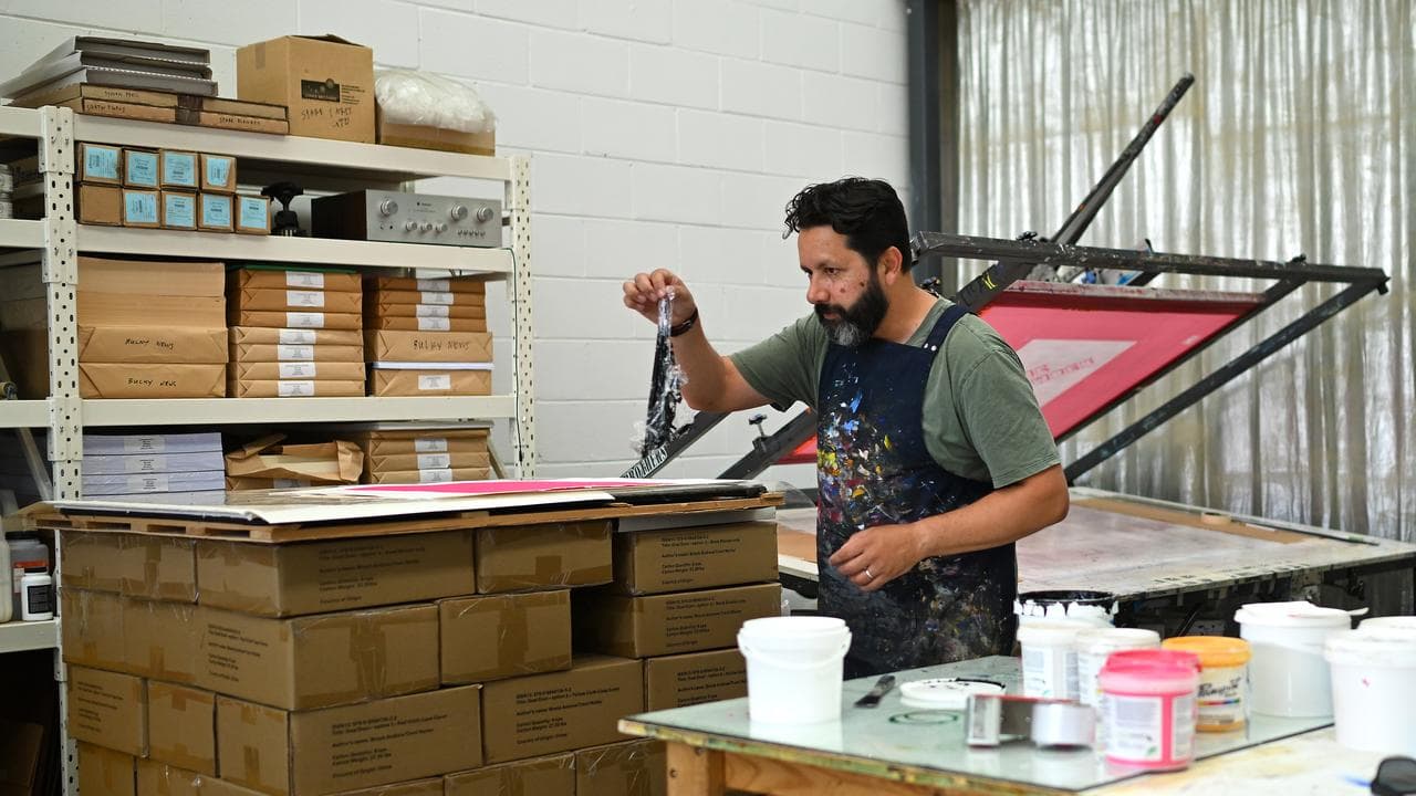 Trent Walter at his printing press