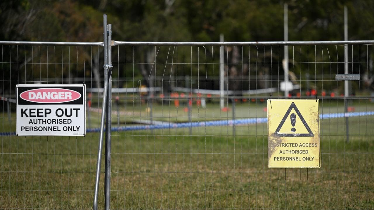 A danger sign at the site of a sinkhole in Heidelberg, Melbourne