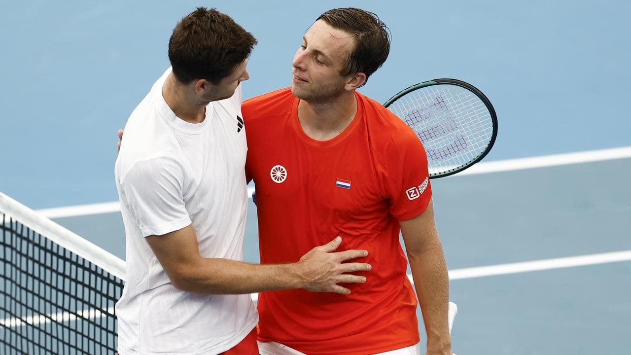 Hubert Hurkacz and Dutchman Tallon Griekspoor embrace