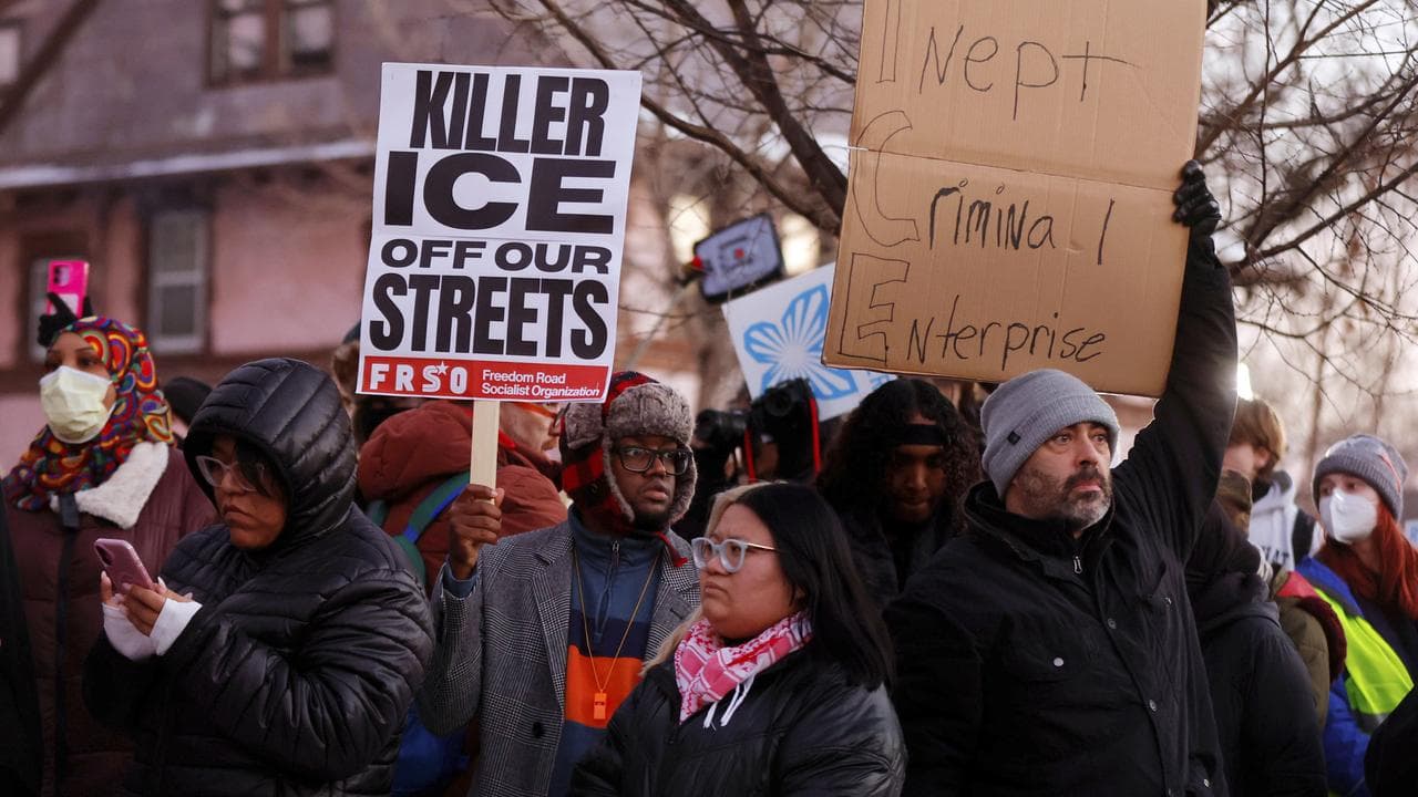 A vigil after an ICE officer killed a woman in Minneapolis