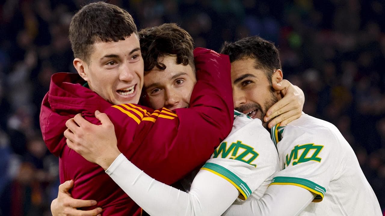 Roma teammates embrace young Aussie Antonio Arena