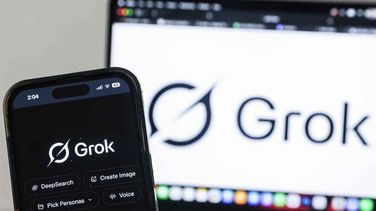 Grok app on a phone and computer