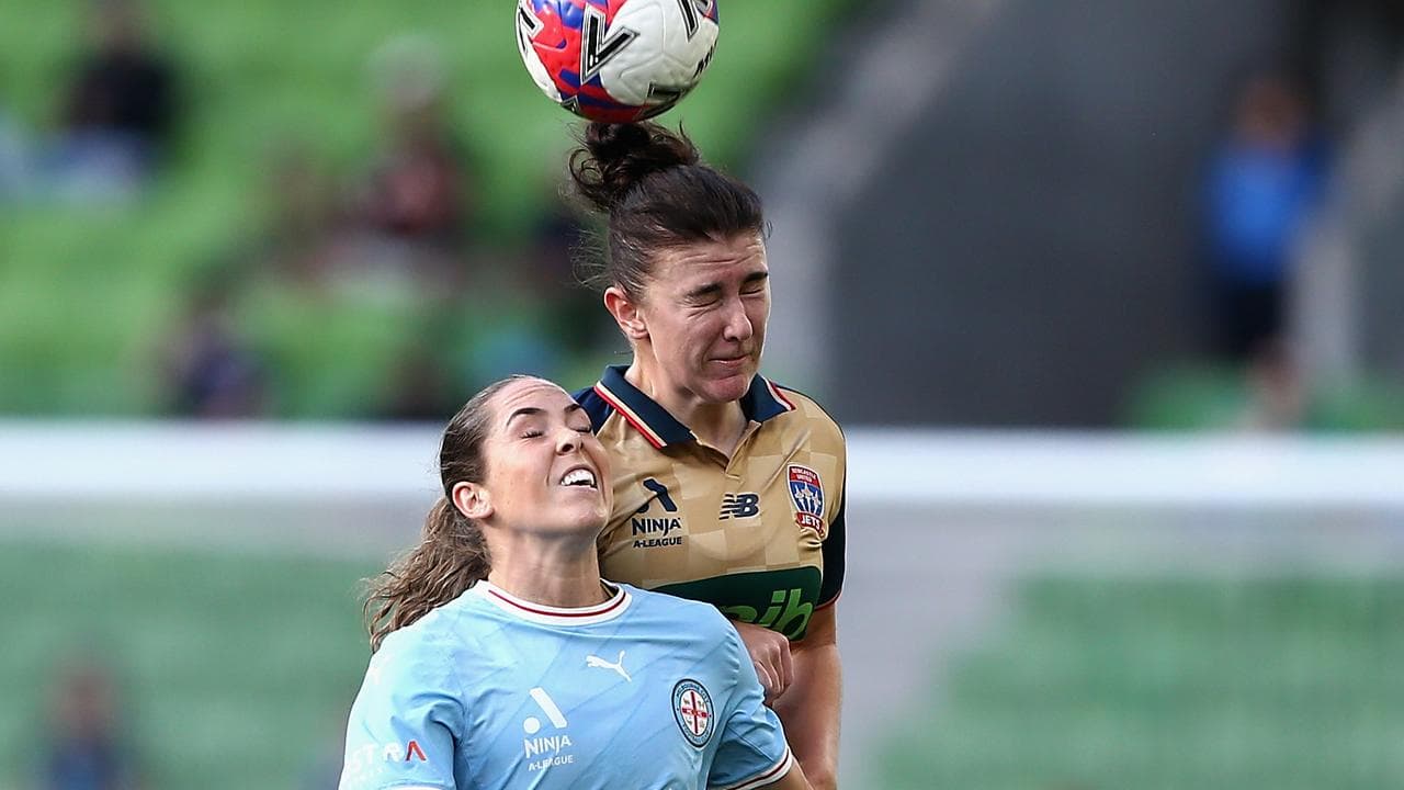 Melbourne City's Ellie Wilson and Newcastle's Charlotte Lancaster