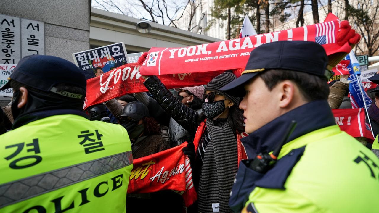 Supporters of Yoon Suk-yeol protest outside court in Seoul