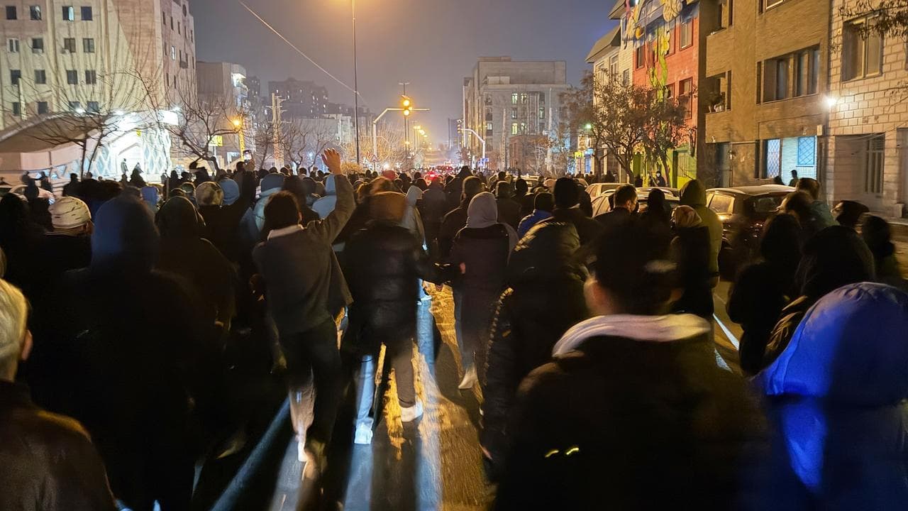 Iranians attend an anti-government protest in Tehran