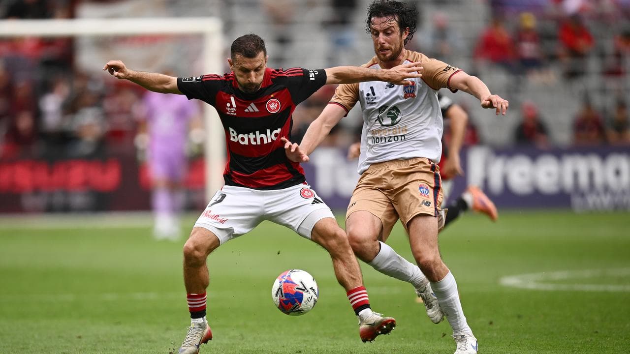 Kosta Barbarouses and Newcastle's Joe Shaughnessy