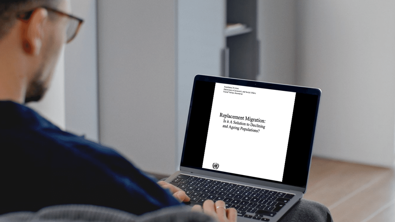 A graphic of someone reading a UN report on a laptop.