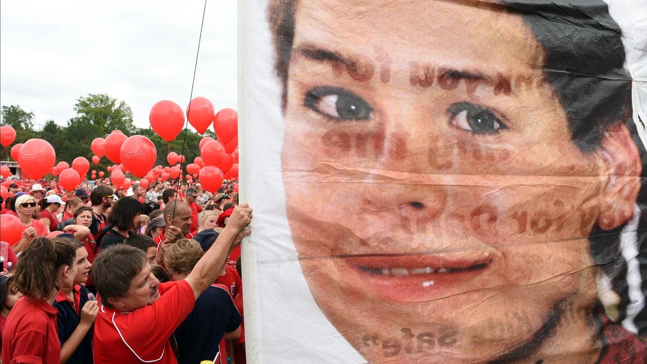 Child safety campaigners with pic of Daniel Morcombe