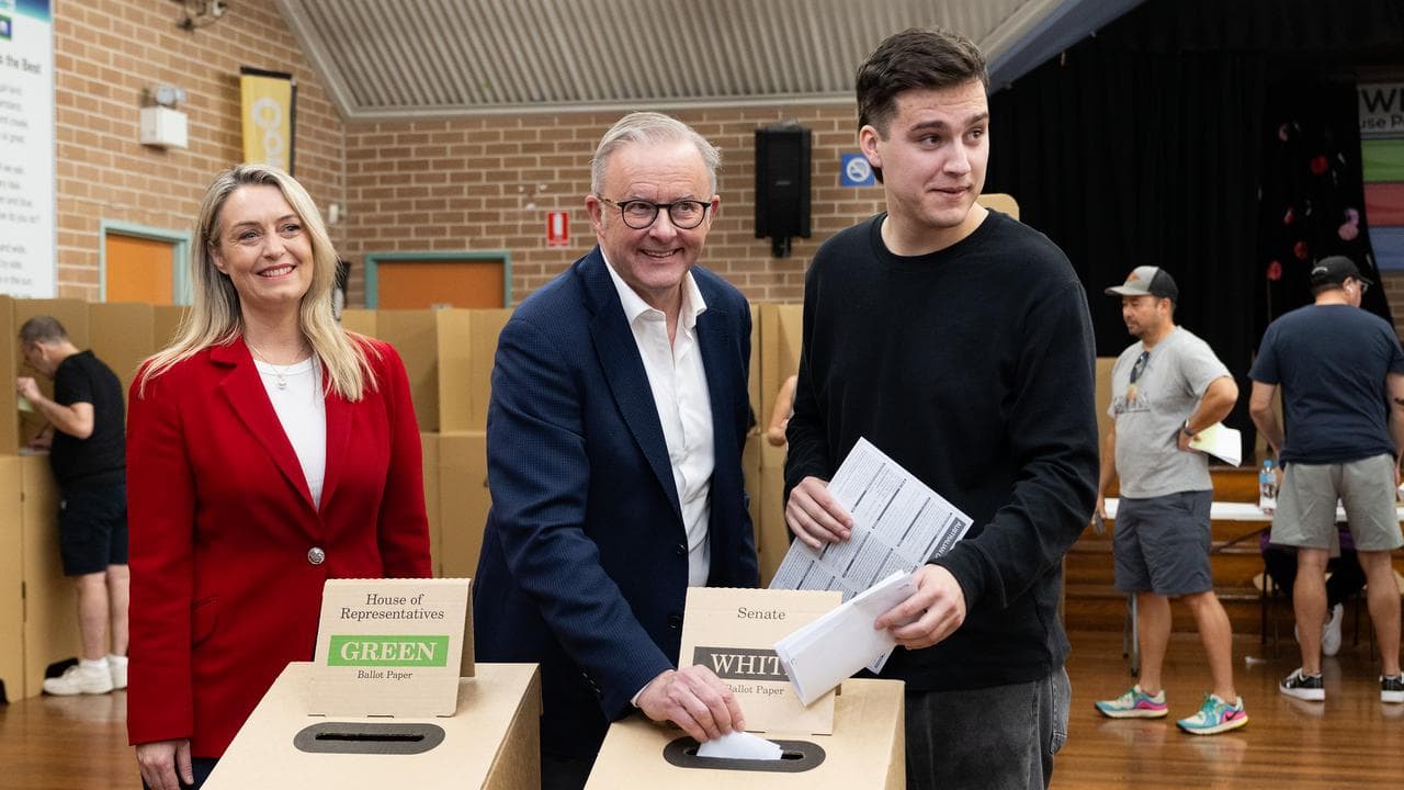 Anthony Albanese and his family casting their votes.