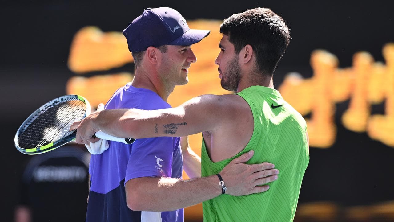 Carlos Alcaraz (right) and Tommy Paul