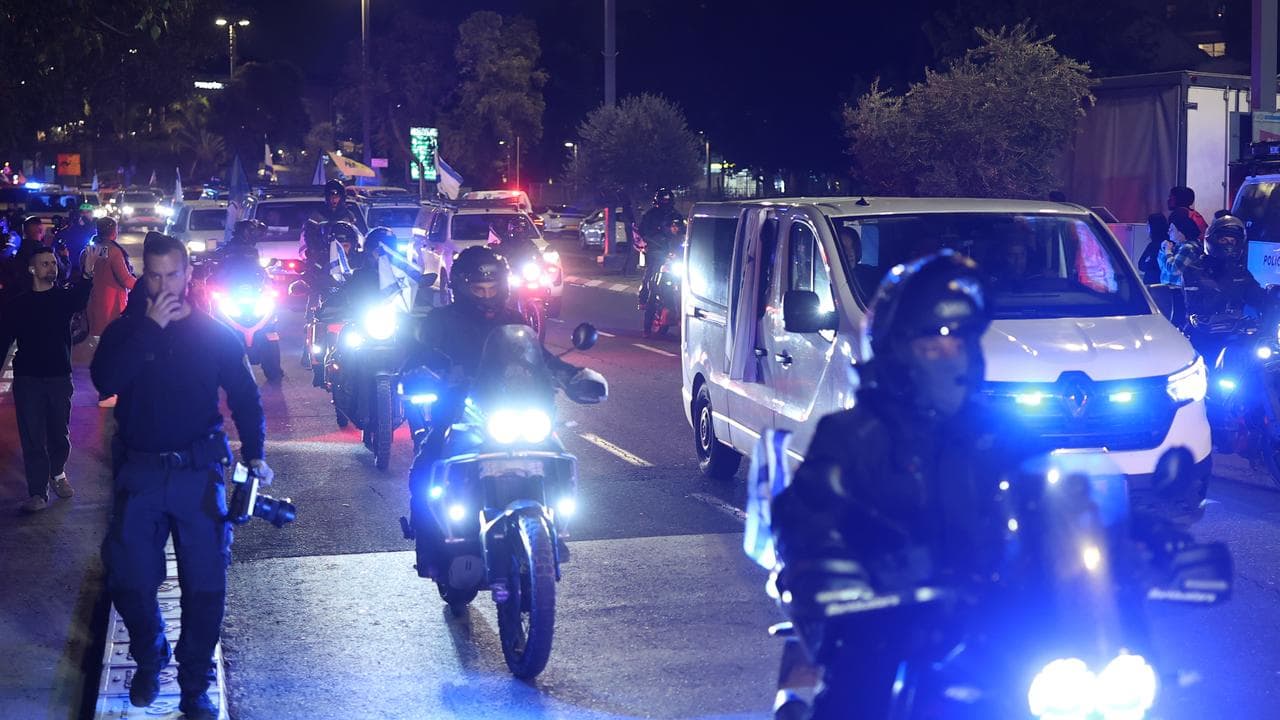 An Israeli police convoy with the remains of Ran Gvili