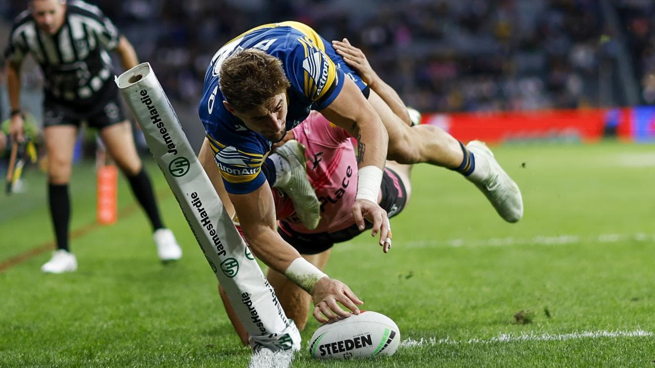 Zac Lomax scoring a try (file)