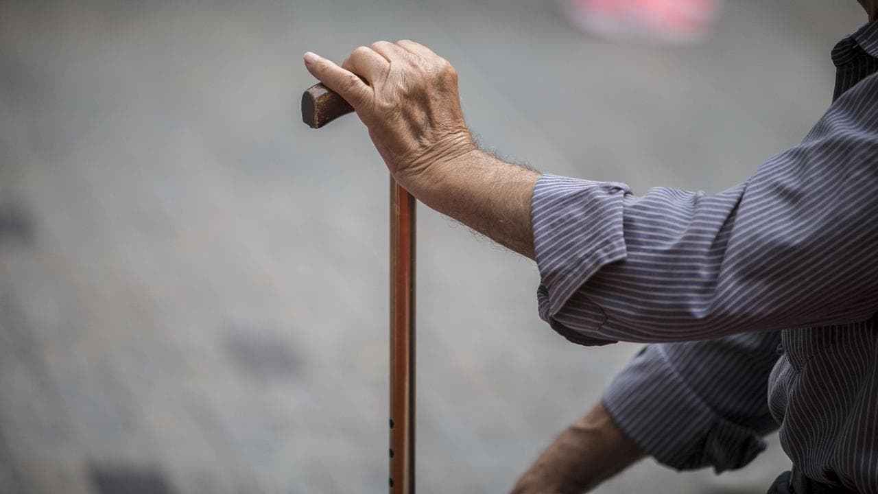 A person with a walking stick (file image)